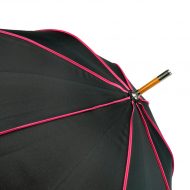 Pink detail on top of woode walker umbrella