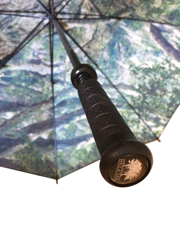 digital photo tree tunnel print canopy with branded handle detail on promotional umbrella