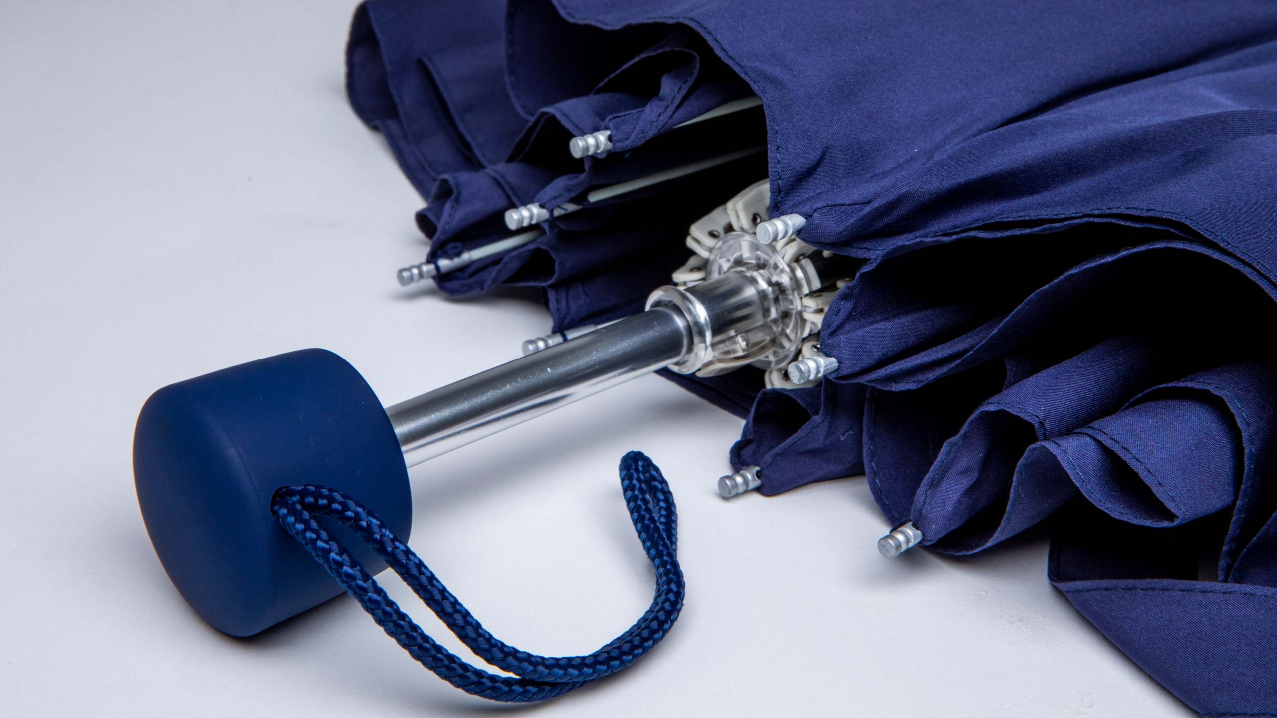 navy-handle-with rope-on-folding-umbrella