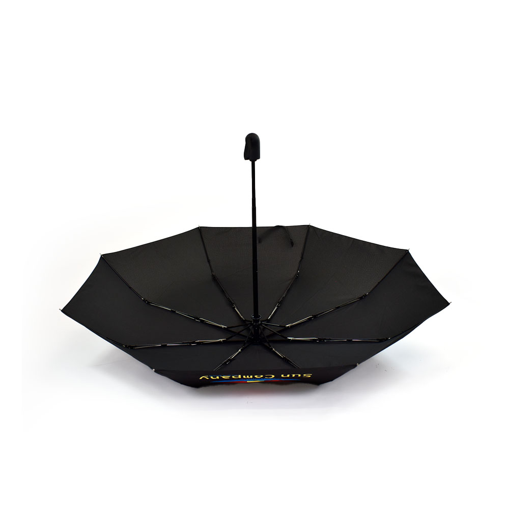 black umbrella upside down with handle facing upwards