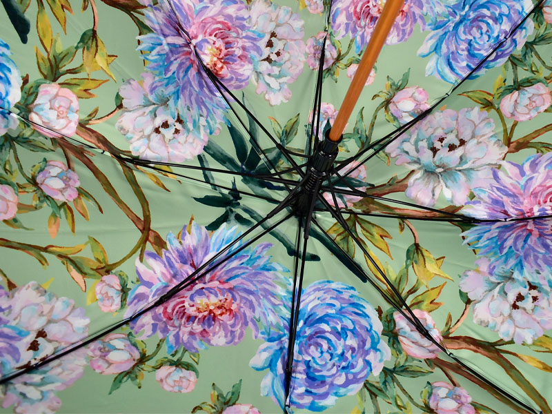 Digital print on inside of umbrella in green, blue and pink