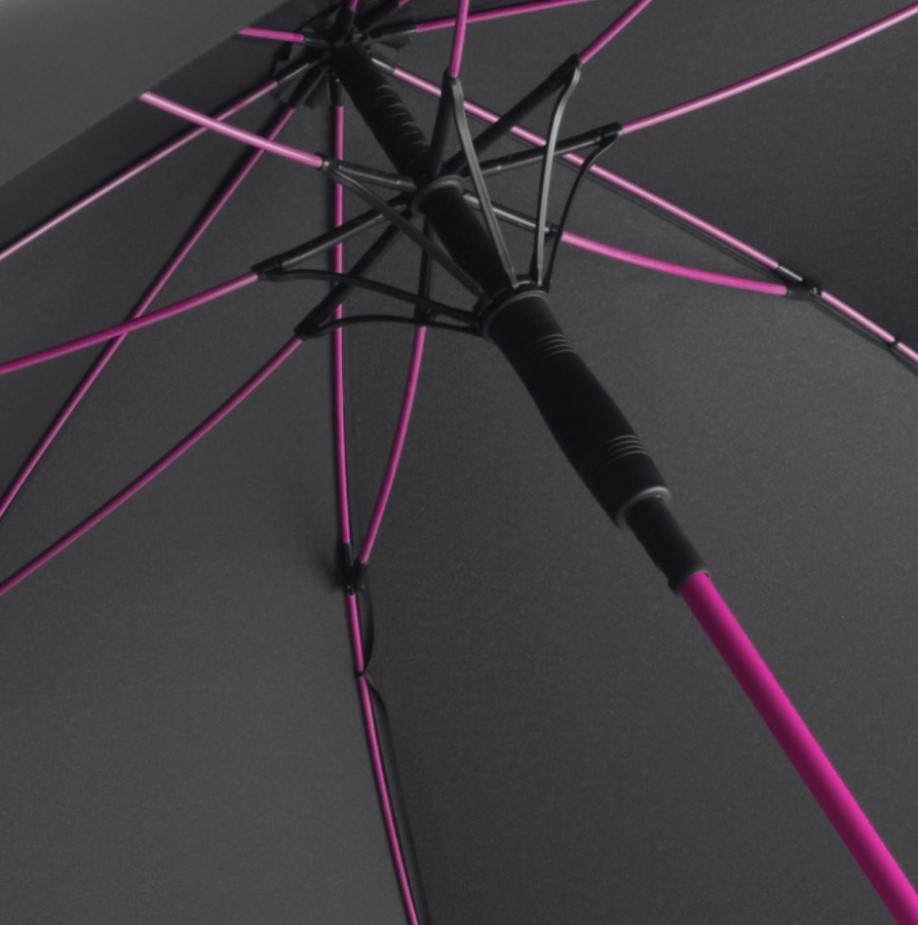 inside of black panel umbrella showing hot pink umbrella frame